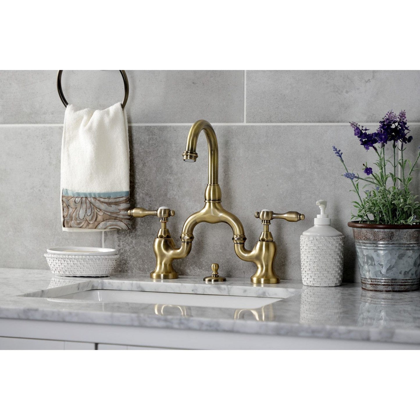 Kingston Brass Kingston Brass Tudor Bridge Bathroom Faucet with Brass Pop-Up, Antique Brass KS7993TAL